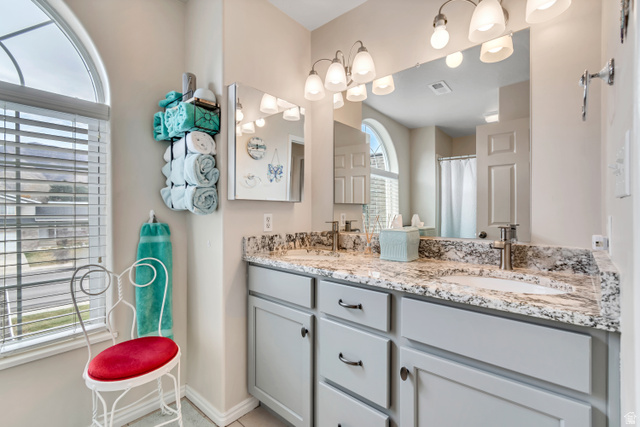 1697 North 500 West Mapleton, UT 84664 - Photo 21 of 50 Bathroom featuring double vanity and curtained shower