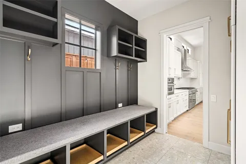 a view of kitchen with furniture and wooden floor