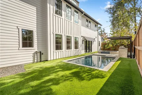 a view of a house with a swimming pool