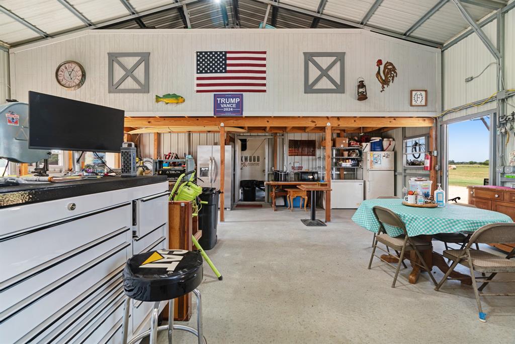 1750 County Road 34430 Sumner, TX 75486 - Photo 11 of 20 a view of a chairs and table in a room