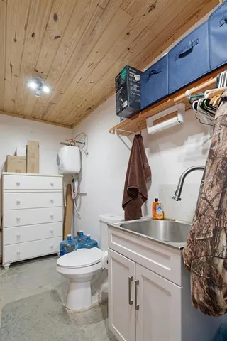 a building outdoor space with patio furniture and ocean view