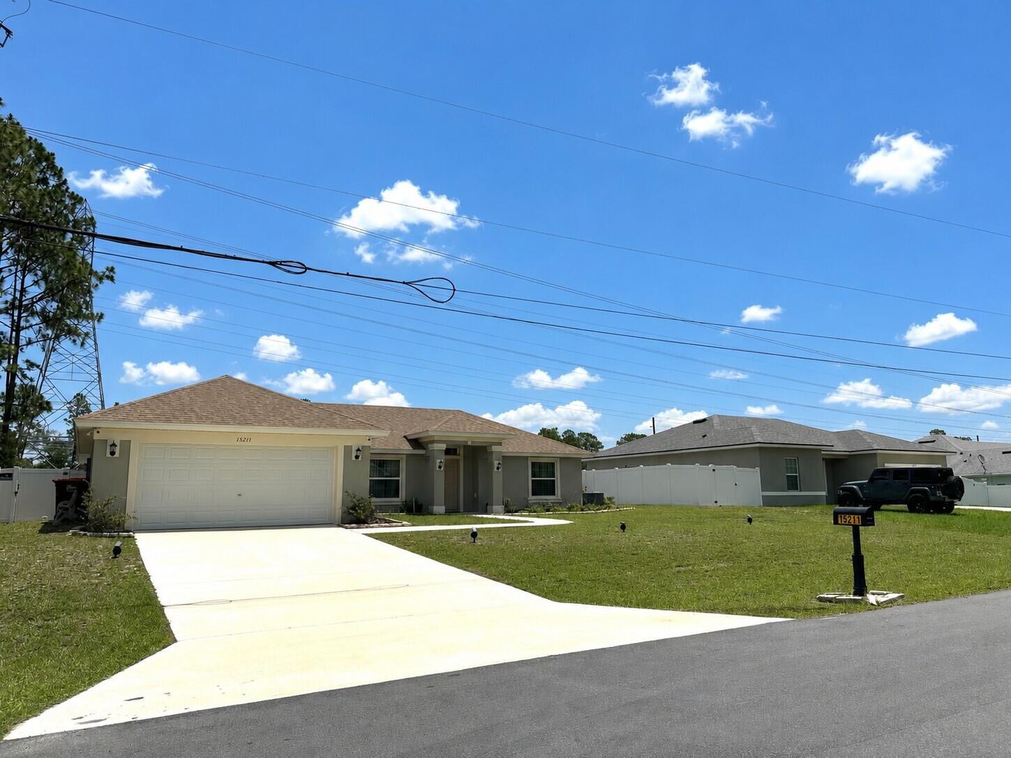 15211 Southwest 65th Ter Road Ocala, FL 34473 - Photo 1 of 22 Almost New 2023 Home!