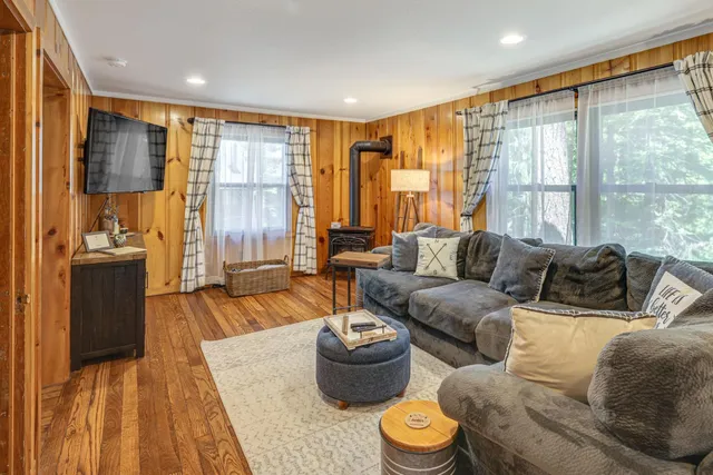 a utility room with cabinets washer and dryer