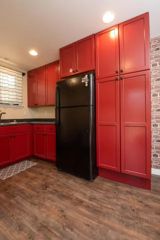 a view of a backyard with swimming pool