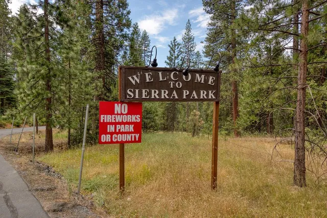 a view of a balcony with wooden floor