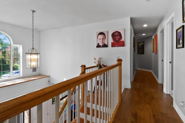 a view of a hallway with windows