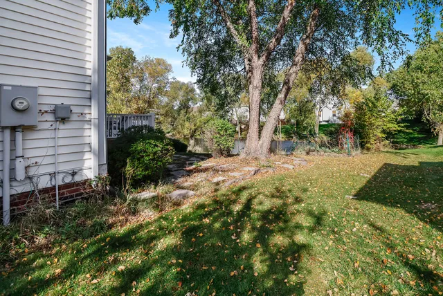 a view of backyard with green space