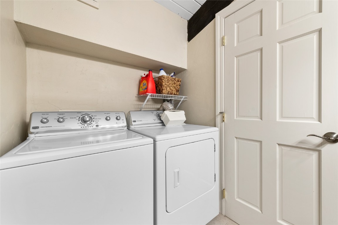 1355 Walton Creek Road, Unit 20 Steamboat Springs, CO 80487 - Photo 26 of 43 a utility room with dryer and washer