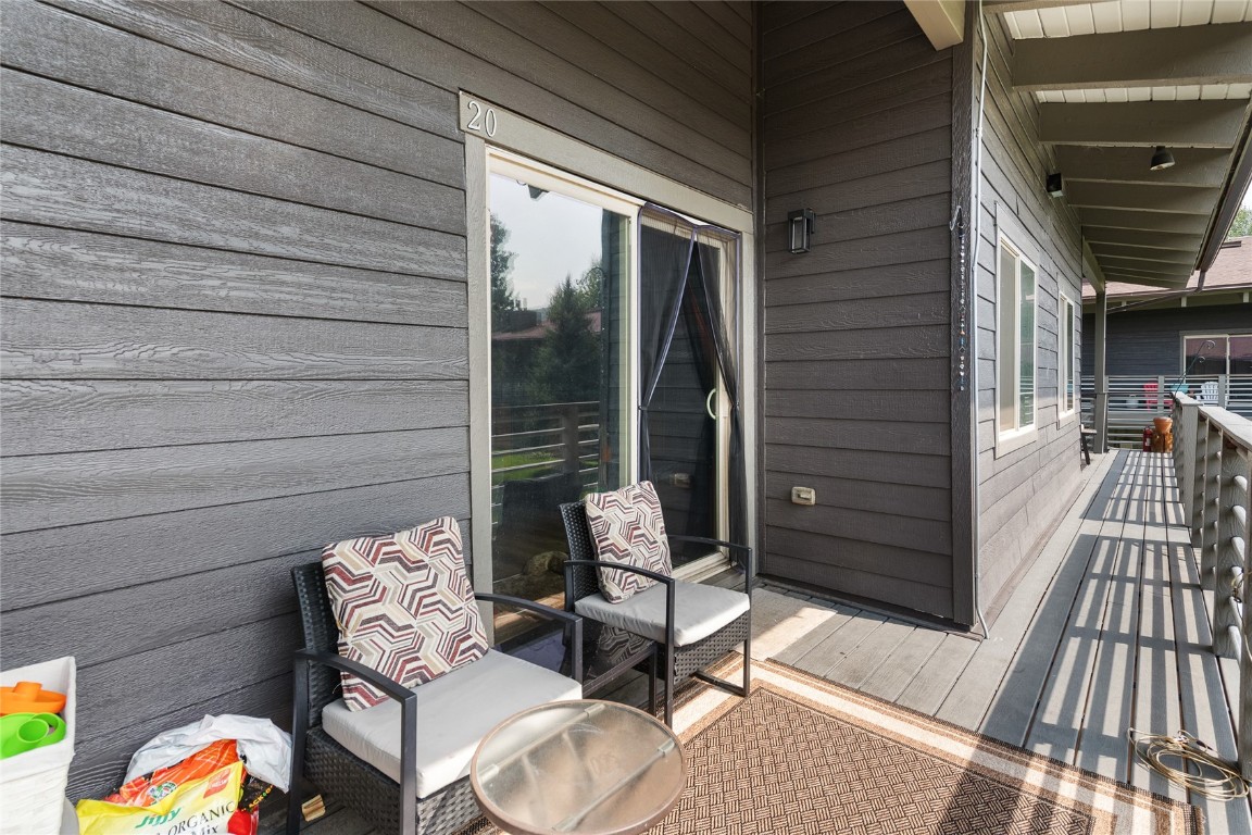 1355 Walton Creek Road, Unit 20 Steamboat Springs, CO 80487 - Photo 39 of 43 a building outdoor space with patio furniture