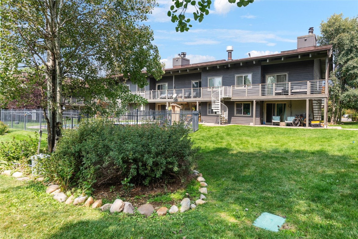 1355 Walton Creek Road, Unit 20 Steamboat Springs, CO 80487 - Photo 42 of 43 a view of a yard in front of house