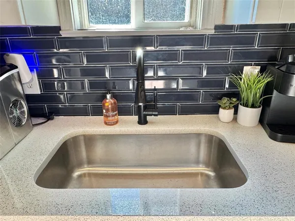 a close view of sink and tap