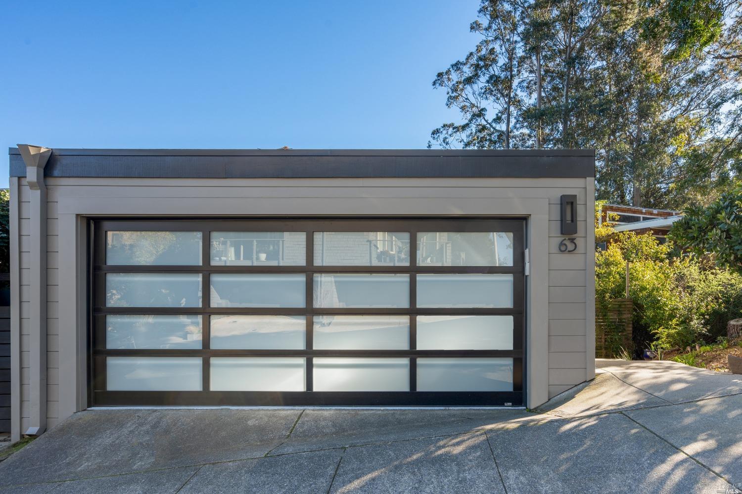 63 Lincoln Drive Sausalito, CA 94965 - Photo 1 of 1 a front view of a house with a yard