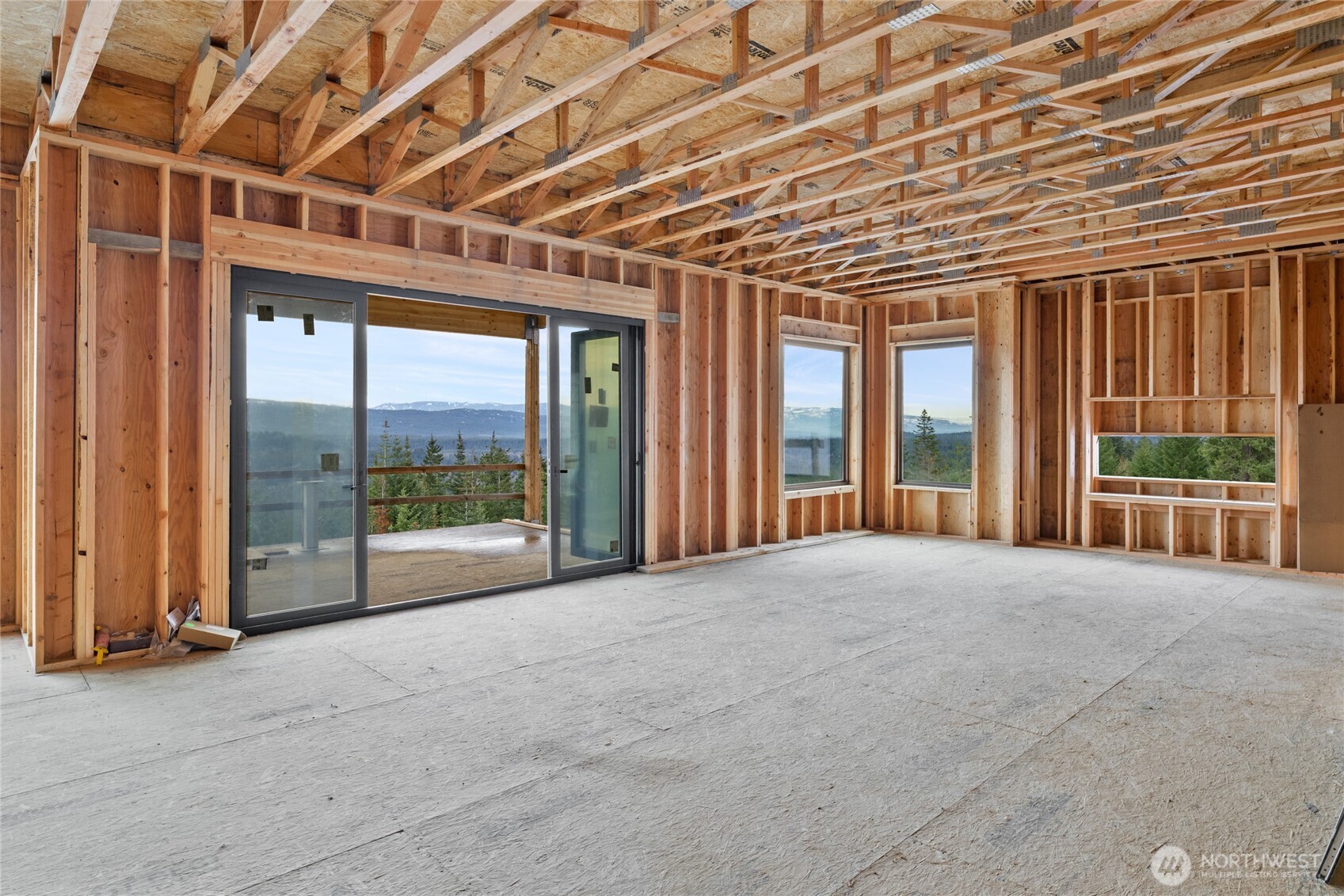 901 Whisper Creek Drive Cle Elum, WA 98922 - Photo 11 of 31 a view of large room with large windows