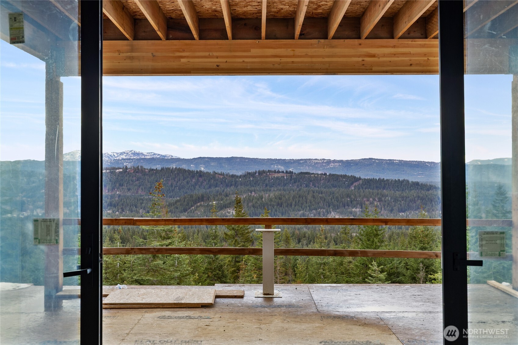 901 Whisper Creek Drive Cle Elum, WA 98922 - Photo 13 of 31 a view of a glass door and a yard from a window