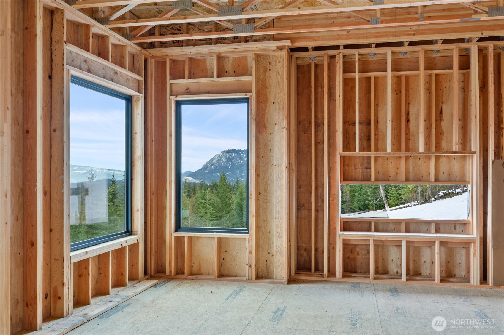 901 Whisper Creek Drive Cle Elum, WA 98922 - Photo 14 of 31 a view of a porch with wooden floor and iron stairs