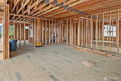 a view of a wooden deck and a yard