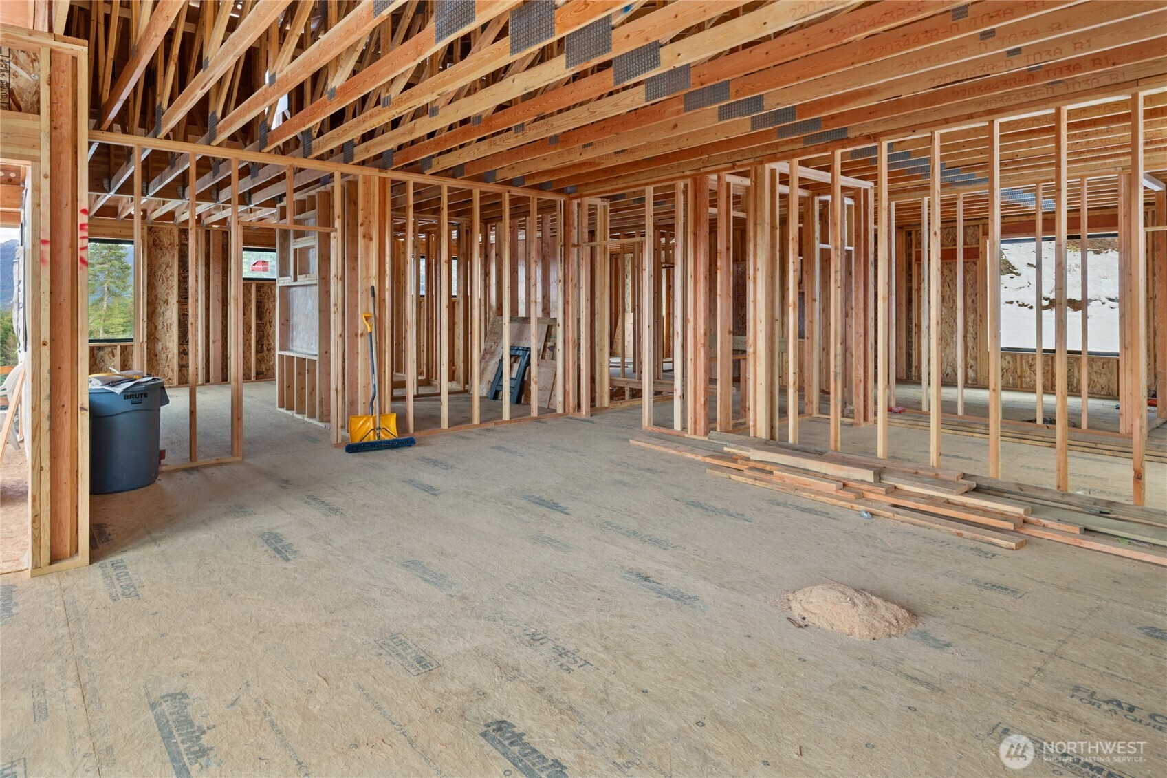 901 Whisper Creek Drive Cle Elum, WA 98922 - Photo 19 of 31 a view of an empty room with wooden walls