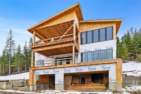 a view of a house with a street