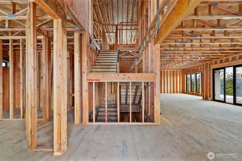 a view of an empty room with windows