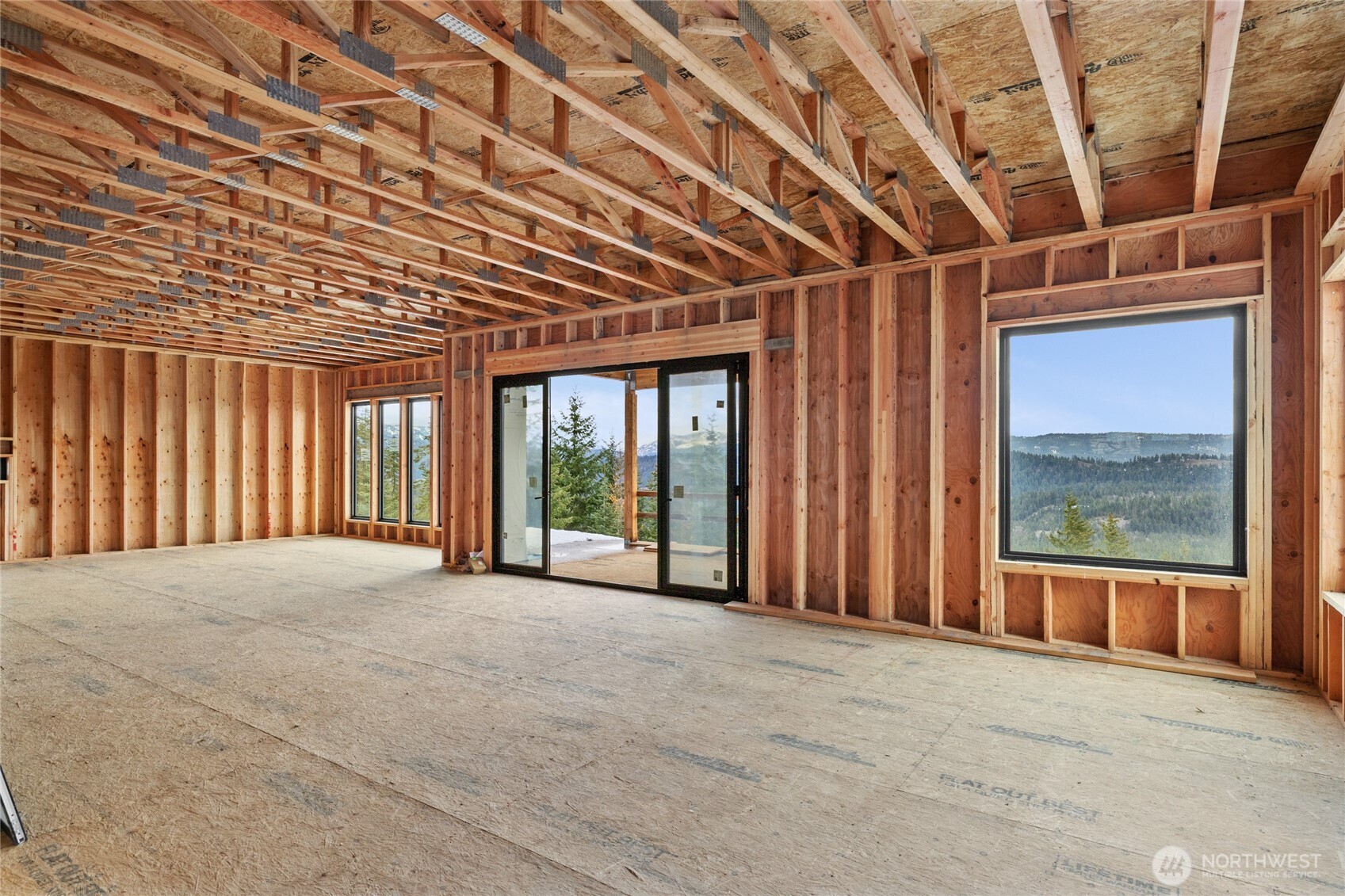 901 Whisper Creek Drive Cle Elum, WA 98922 - Photo 8 of 31 a view of an empty room with windows