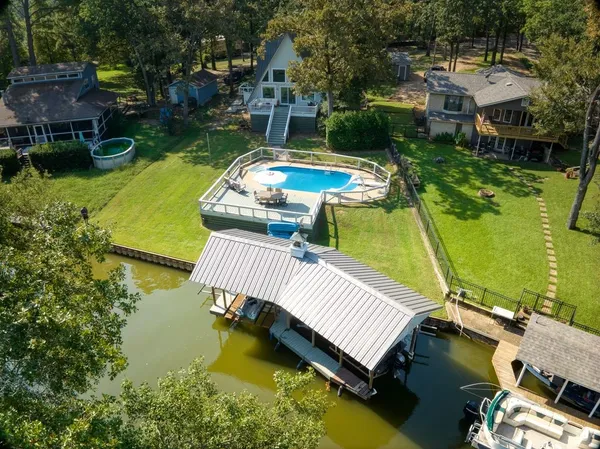 a view of a swimming pool with a patio
