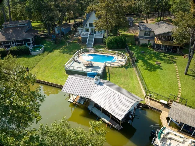 a view of a swimming pool with a patio