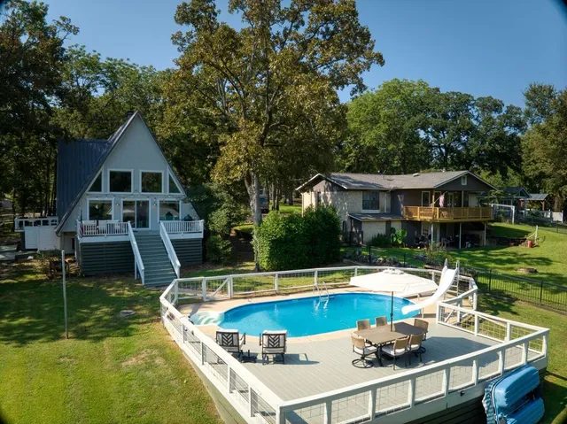 a view of a house with a swimming pool