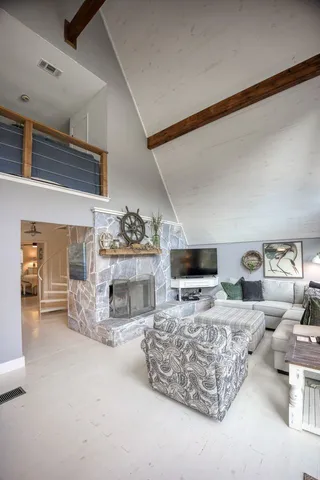 a living room with furniture and a window