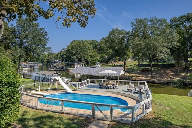 a view of a house with a swimming pool