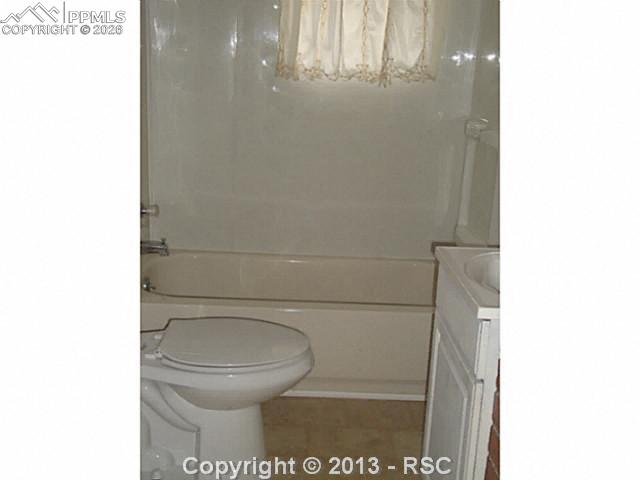 9390 Mountain Road Cascade, CO 80809 - Photo 6 of 7 a bathroom with a toilet and a shower