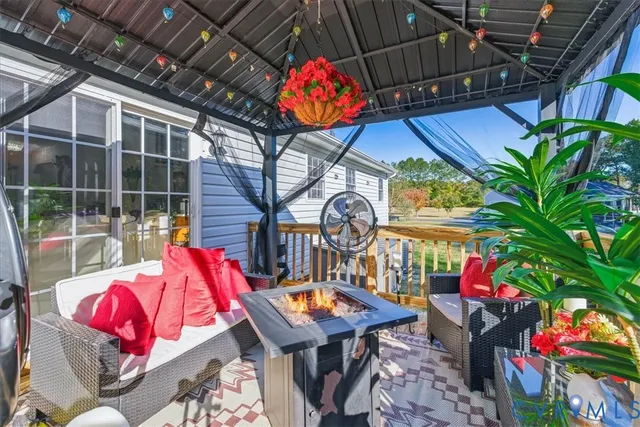 a view of empty room with trees
