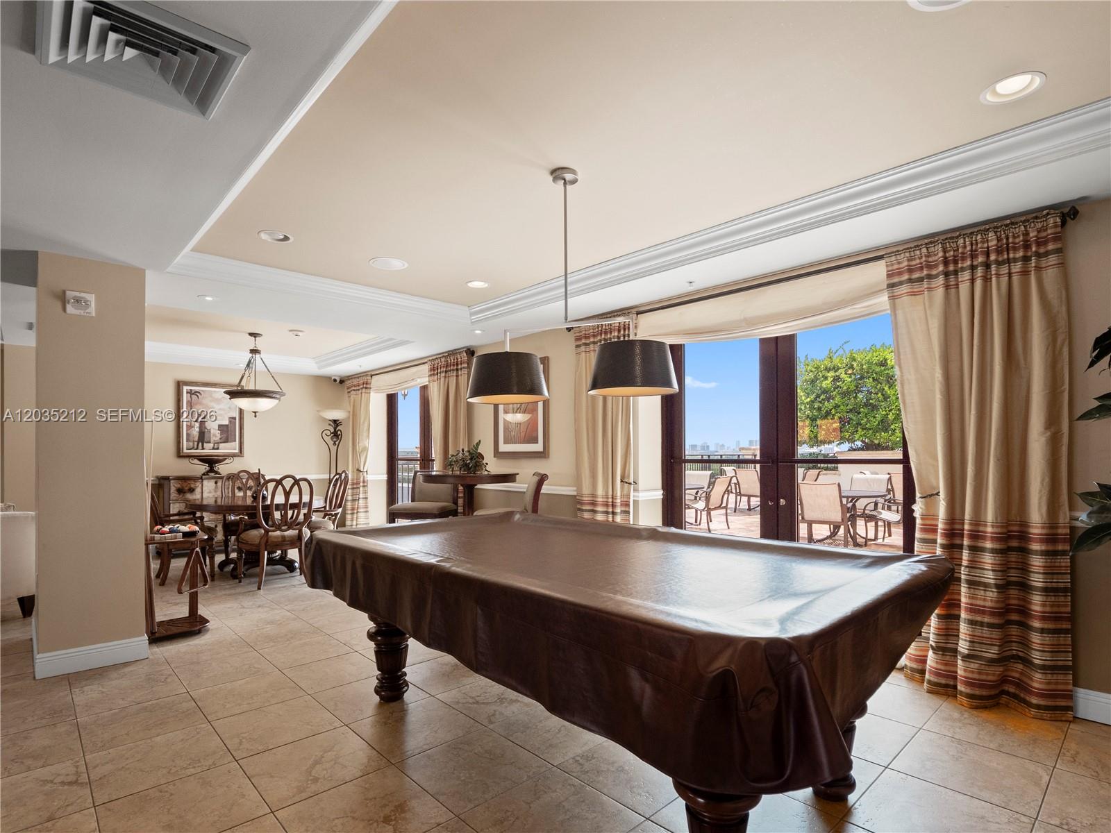 888 Douglas Road, Unit 302 Coral Gables, FL 33134 - Photo 40 of 51 COMMUNITY ROOM POOL TABLE