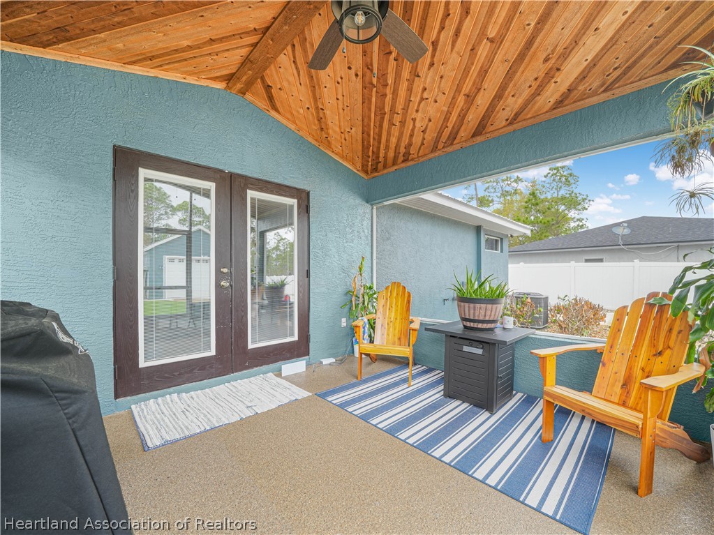 5430 Lakewood Road Sebring, FL 33875 - Photo 25 of 40 Rear Screened Porch