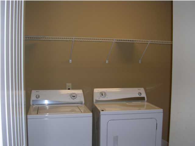 102 Willow Mist Road Inlet Beach, FL 32461 - Photo 11 of 15 a utility room with dryer and washer