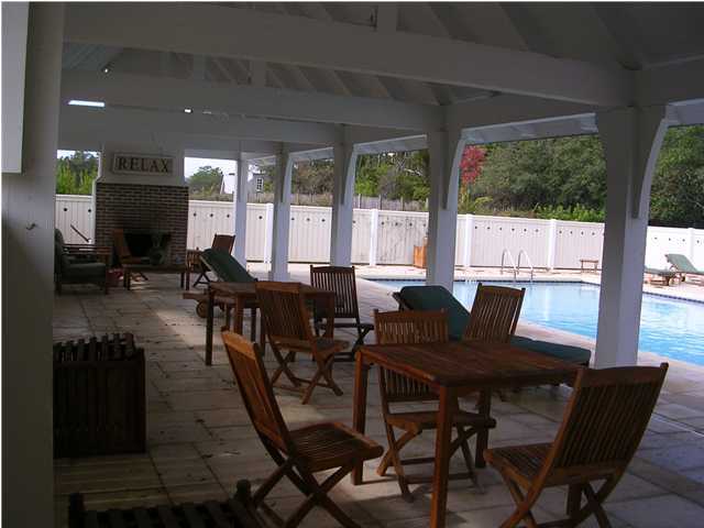 102 Willow Mist Road Inlet Beach, FL 32461 - Photo 14 of 15 a view of a dining room with furniture window and outside view