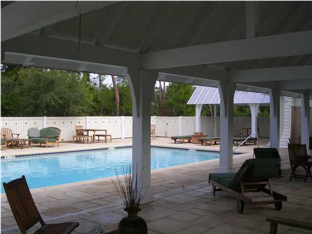 102 Willow Mist Road Inlet Beach, FL 32461 - Photo 15 of 15 a living room with furniture and a floor to ceiling window