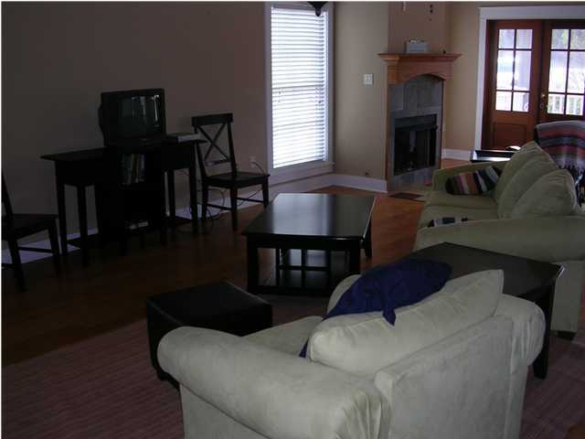 102 Willow Mist Road Inlet Beach, FL 32461 - Photo 3 of 15 a living room with furniture and a fireplace