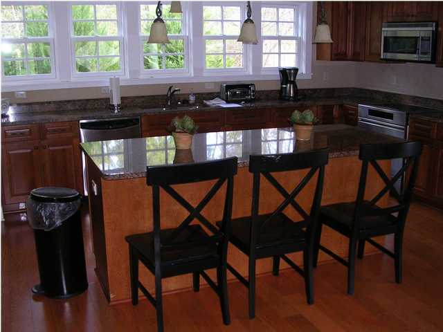 102 Willow Mist Road Inlet Beach, FL 32461 - Photo 4 of 15 a kitchen with a table chairs and a window