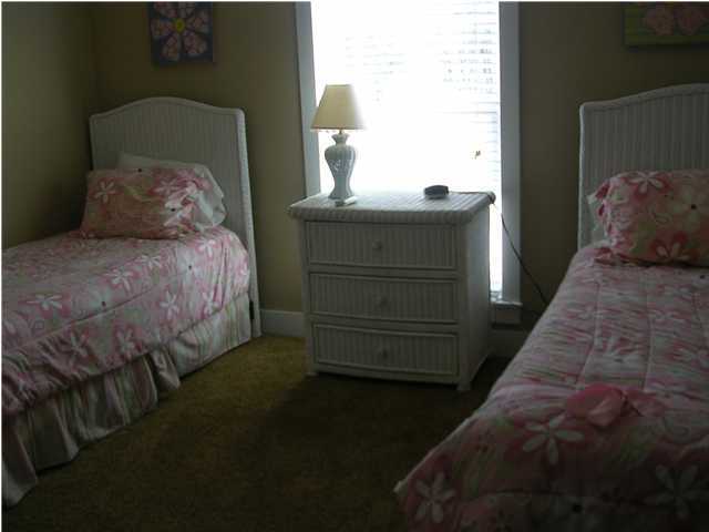 102 Willow Mist Road Inlet Beach, FL 32461 - Photo 6 of 15 a bedroom with a bed and a dresser