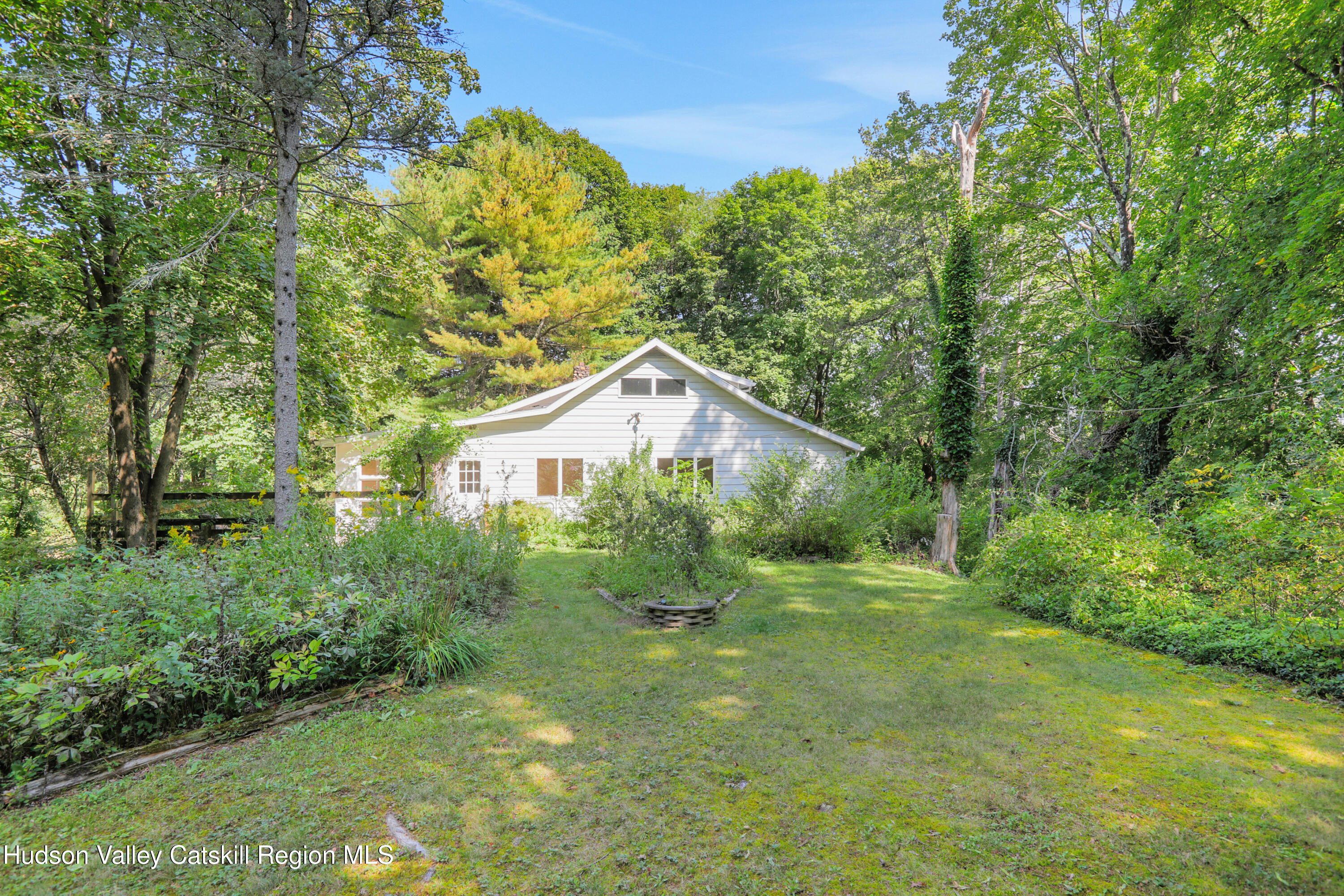 197 Old Rte 32 Saugerties, NY 12477 - Photo 28 of 31 a yellow house in middle of the forest