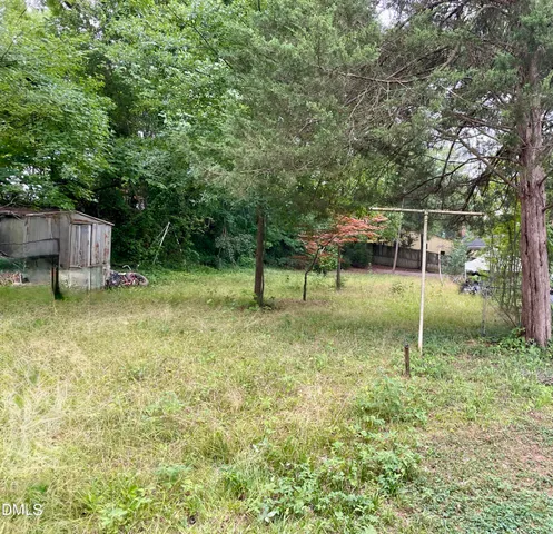 a backyard of a house with entertaining space