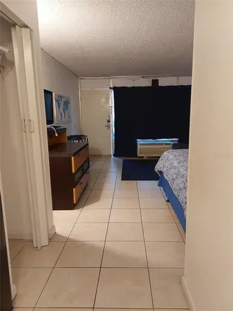 a view of kitchen and living room with furniture