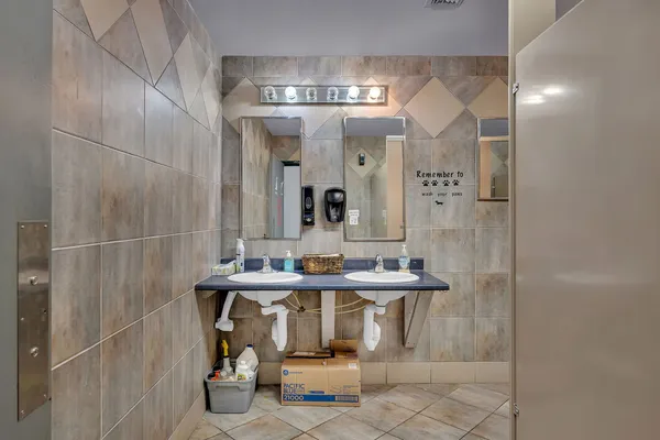a bathroom with a shower and toilet