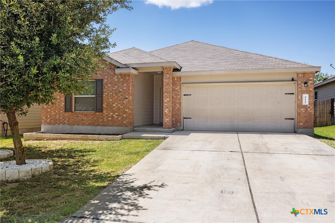 a front view of house with yard