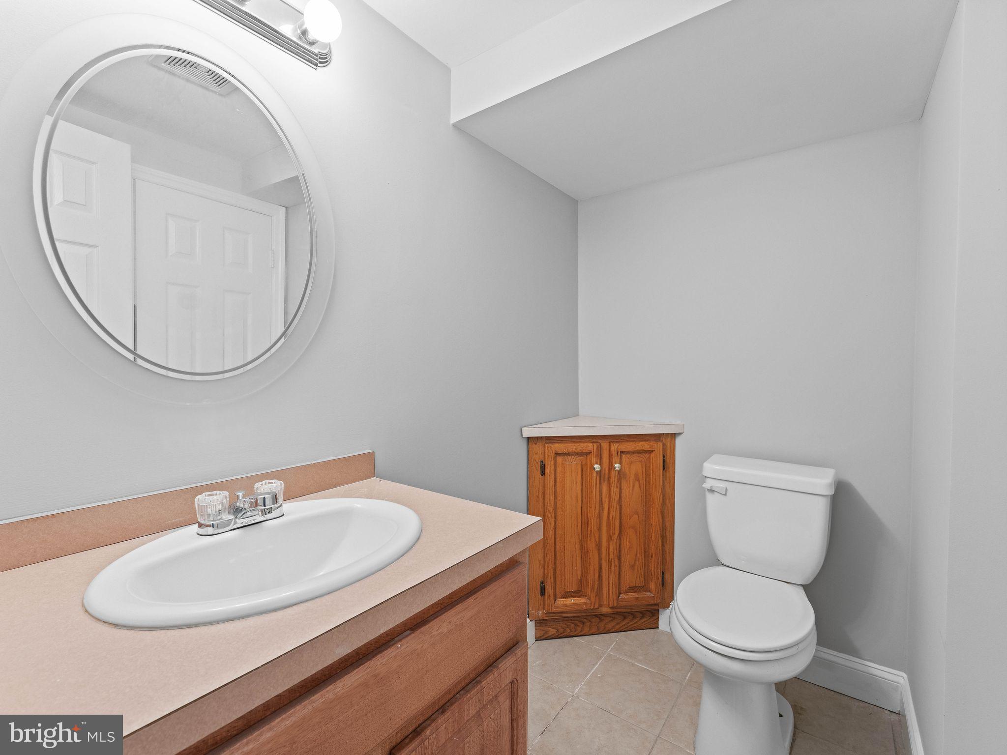 8 Chesterfield Road Sewell, NJ 08080 - Photo 42 of 57 a bathroom with a toilet sink and mirror