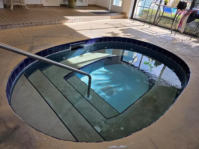 a view of a balcony with furniture