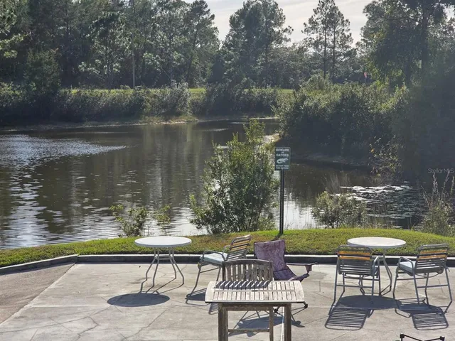 a garden view with a seating space