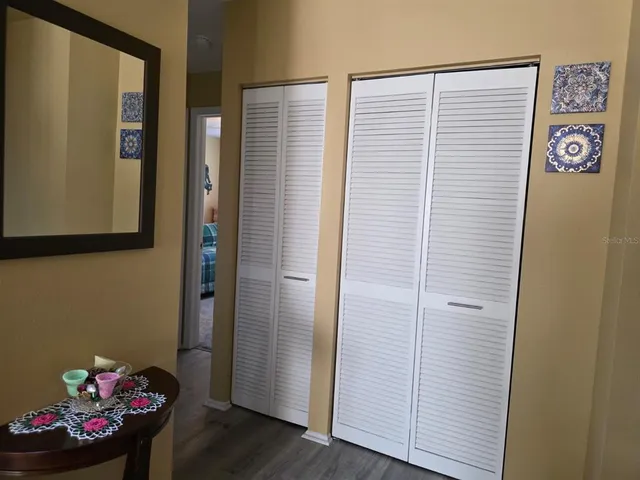 a view of a room that has a bench in it