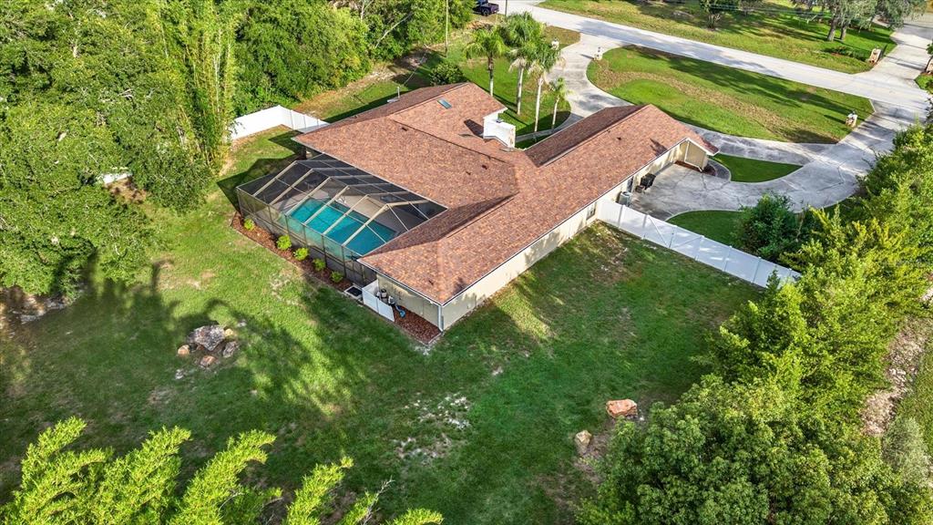 7487 River Country Drive Weeki Wachee, FL 34607 - Photo 51 of 53 an aerial view of a house with a garden