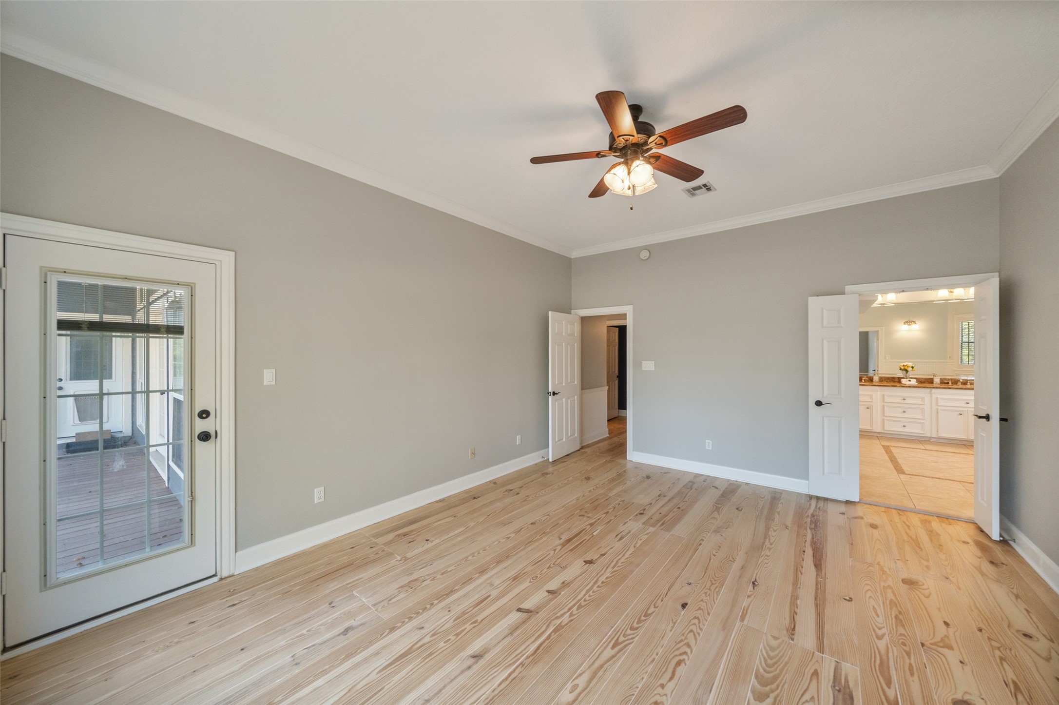 36003 Post Oak Circle Magnolia, TX 77355 - Photo 16 of 50 wooden floor in an empty room with a window